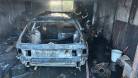 Машина полностью сгорела внутри гаража в Караганде